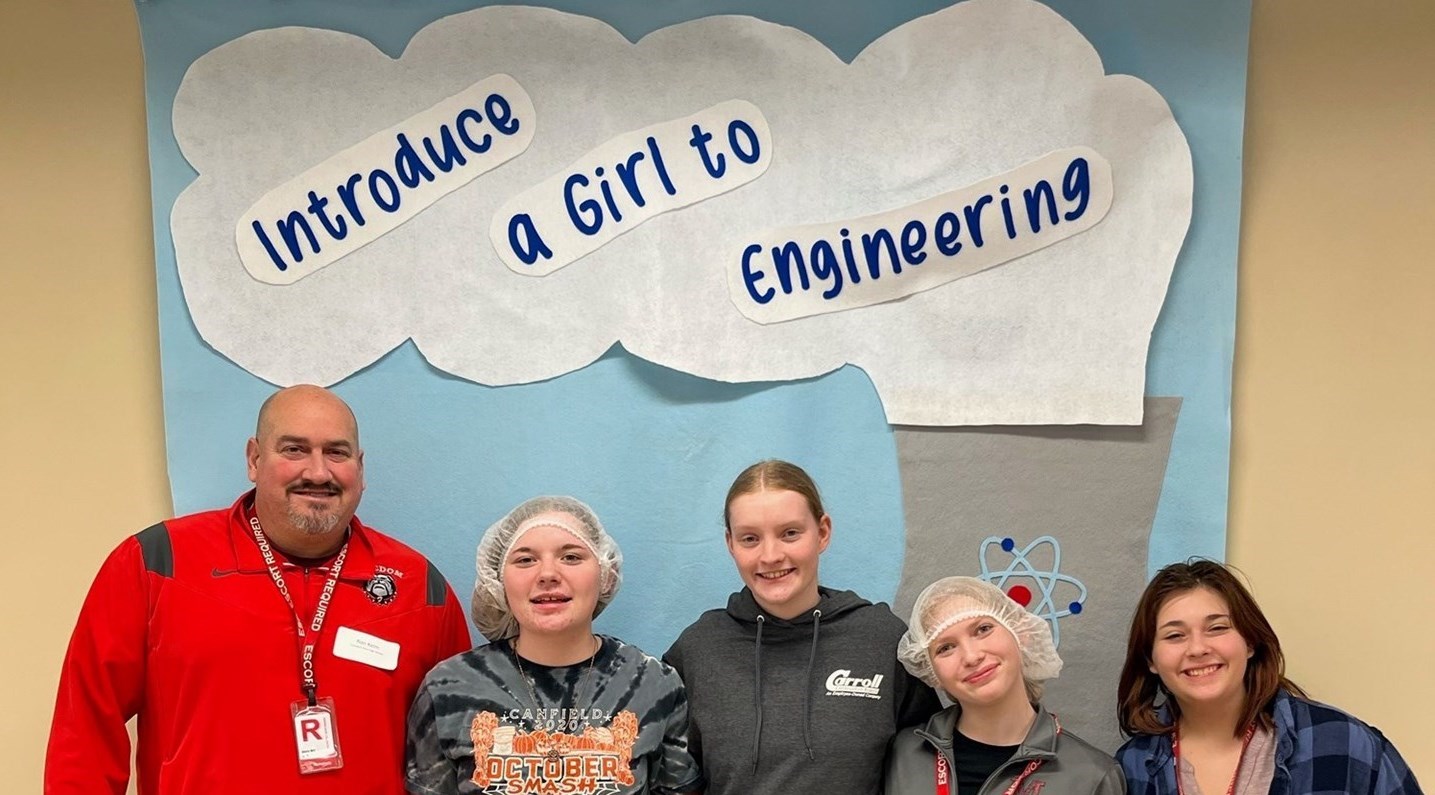 Paper cloud in the background with &#34;introduce a girl to engineering&#34;  