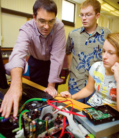 Tom Hickey with some students